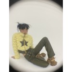 Green star faux leather trousers